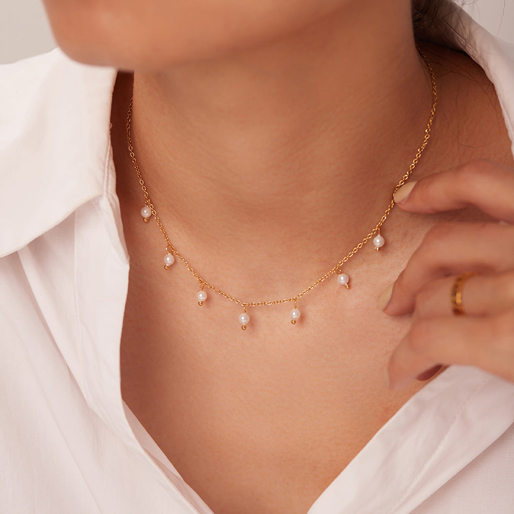 Gold choker necklace with small white pearl charms for women