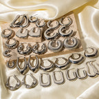 Textured silver hoop earrings collection for fashion