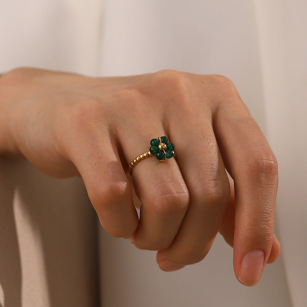 Adjustable Green Stone Flower Ring on Woman's Hand