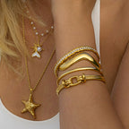 Starfish Pearl Pendant Necklace with a Sense of Luxury and Niche Open Mouth Bracelet Titanium Steel Accessory