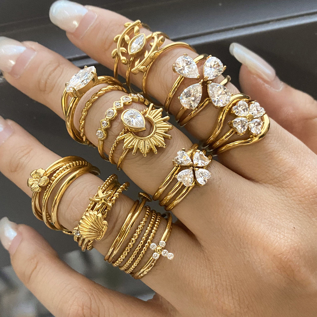 premium 18k gold plated stackable zircon stainless steel ring set crafted for modern everyday elegance